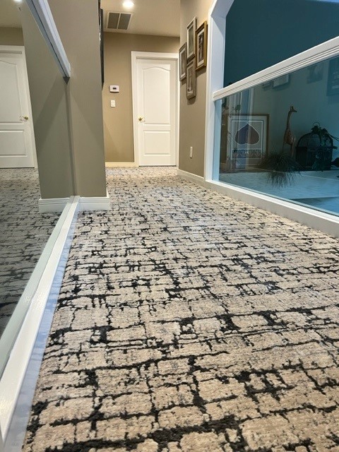 Nourison Ebb Tide Sea Storm Carpet in a hallway